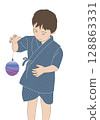 Boy at a festival holding a yo-yo 128863331