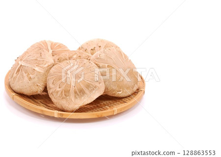 Shiitake mushrooms, raw donko, large, ingredients, light background Shiitake mushrooms, raw donko, large, ingredients, light background 128863553