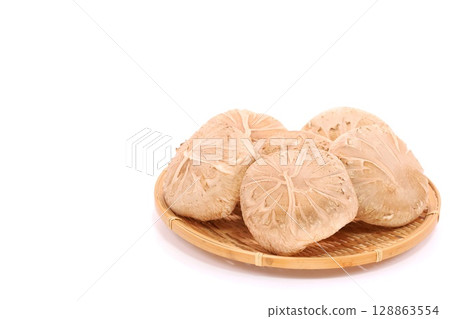 Shiitake mushrooms, raw donko, large, ingredients, light background Shiitake mushrooms, raw donko, large, ingredients, light background 128863554