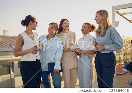 A Diverse Group of Talented Women Actively Engaging in Meaningful Professional Discussion 128864648