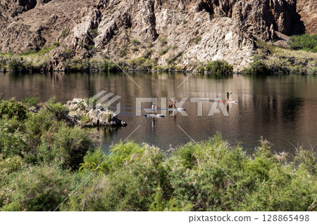Paddleboarding on the Waters of the Colorado River in Arizona 128865498