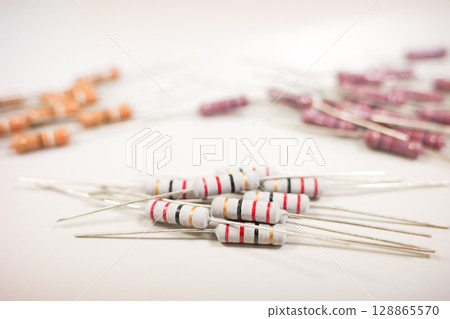 Colorful carbon film resistors isolated on white background Colorful carbon film resistors isolated on white background 128865570