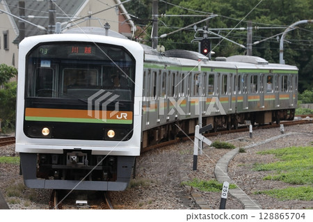Hachiko Line 209 Series 71 train (former Rinkai Line) entering Hakonegasaki Station 128865704