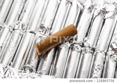 Rectal propolis suppository for eliminating edema and microbes in urology during the treatment of prostatitis, close-up Rectal propolis suppository for eliminating edema and microbes in urology during the treatment of prostatitis, close-up 128865756