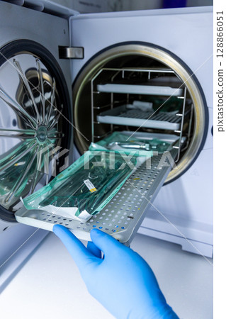 Autoclave in Action: Ensuring Hygiene for Surgical Instruments and Medical Equipment Within a Sterilization Process 128866051