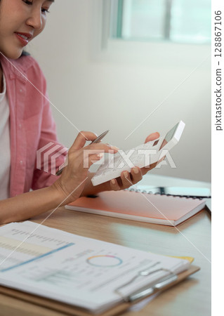 Work from Home Professional engaged in data analysis with smartphone Work from Home Professional engaged in data analysis with smartphone 128867106