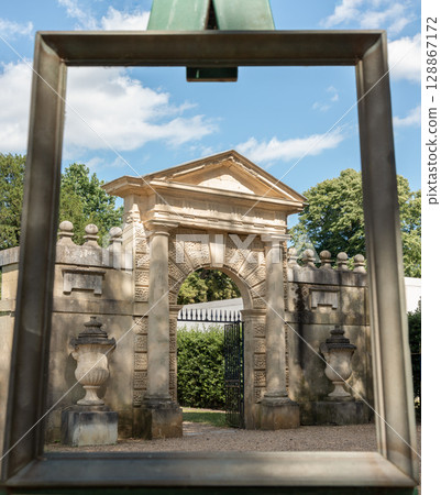 The large frame aligns with the view of the Inigo Jones Gateway, which is located within the Chiswick House Gardens. 128867172