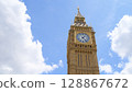 Big Ben and Elizabeth Tower in sunlight on blue sky background with copy space. Palace of Westminster in London, England 128867672