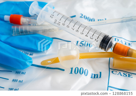 Foley catheter and urine drainage bag collect urine for disability or patient in hospital. Foley catheter and urine drainage bag collect urine for disability or patient in hospital. 128868155