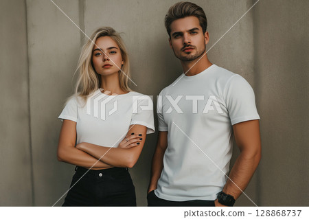 Man and woman wearing blank white t-shirt 128868737