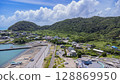 Drone aerial view of the coast and townscape of Kamogawa City, Chiba Prefecture 128869950