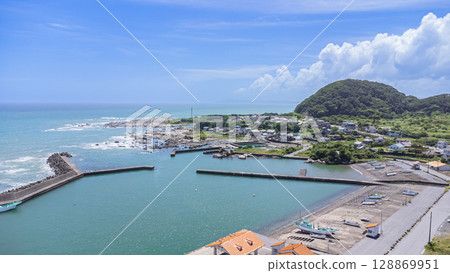 Drone aerial view of the coast and townscape of Kamogawa City, Chiba Prefecture 128869951