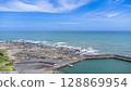 Drone aerial view of the coast and townscape of Kamogawa City, Chiba Prefecture 128869954