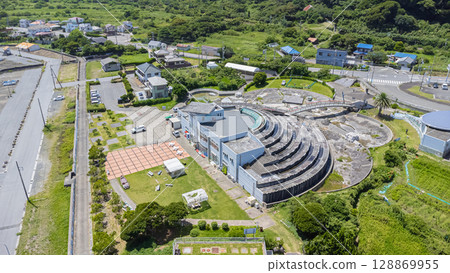 Drone aerial view of the coast and townscape of Kamogawa City, Chiba Prefecture 128869955