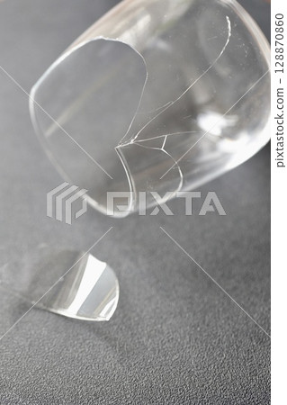Broken stemless wine glass 128870860