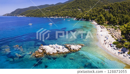 Greece summer destinations. Milia one of the most beautiful beaches in Skopelos island, Sporades.  128871055
