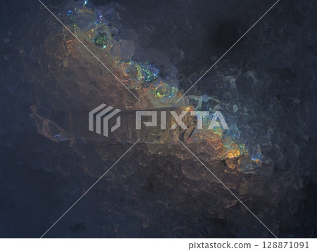 Rainbow is reflected in the ice 128871091