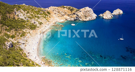 Sporades, Greece . landmarks of Skiathos Island. Kastro beach famous for his ancient ruined castle.  Sporades, Greece . landmarks of Skiathos Island. Kastro beach famous for his ancient ruined castle.  128871116