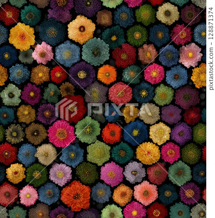 A Seamless pattern of colorful hexagonal flowers, each flower a different color and shape. The background is made of black fabric. 128871374