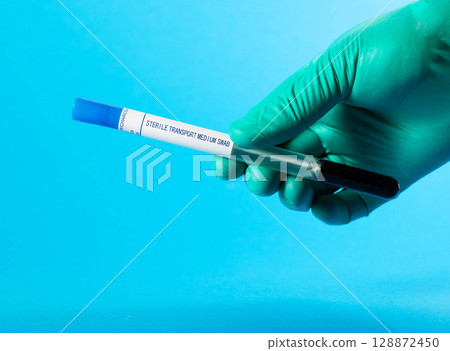 A reproductive doctor holds a test tube with sperm in his hand to determine the reproductive function of a man. Spermogram for infections and seminal fluid, tests in urology. Copy space for text, A reproductive doctor holds a test tube with sperm in his hand to determine the reproductive function of a man. Spermogram for infections and seminal fluid, tests in urology. Copy space for text, 128872450