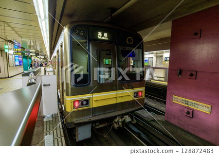 Subway Higashiyama Line, 5050 series train parked at Motoyama Station Subway Higashiyama Line, 5050 series train parked at Motoyama Station 128872483