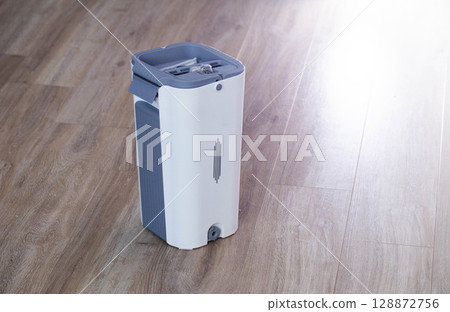 Modern mop with wringer and bucket for easy cleaning, industry. Copy space for text, antistatic 128872756