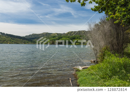 Lakeside view of Lake Tutira in Hawke's Bay, New Zealand Lakeside view of Lake Tutira in Hawke's Bay, New Zealand 128872814