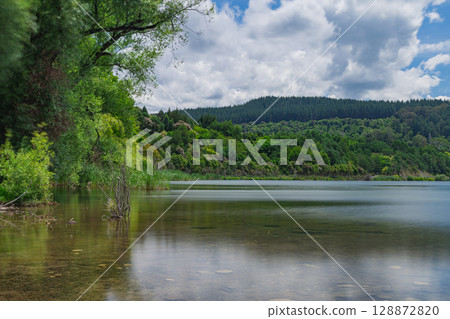 Lakeside view of Lake Tutira in Hawke's Bay, New Zealand Lakeside view of Lake Tutira in Hawke's Bay, New Zealand 128872820