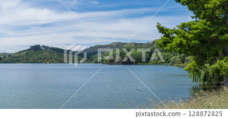 Lakeside view of Lake Tutira in Hawke's Bay, New Zealand Lakeside view of Lake Tutira in Hawke's Bay, New Zealand 128872825