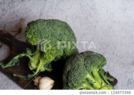 Fresh Broccoli On Cutting Board Prepared For Cooking 128873398