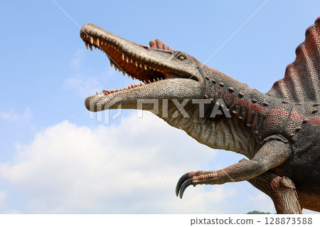 Pattaya,Thailand-January 28,2022:The dinosaurs statue is beautiful for travel in holiday at Nong Nooch Tropical Botanical Garden Pattaya,Thailand-January 28,2022:The dinosaurs statue is beautiful for travel in holiday at Nong Nooch Tropical Botanical Garden 128873588