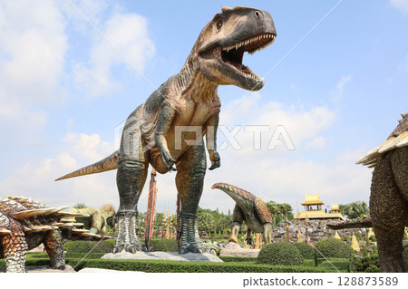 Pattaya,Thailand-January 28,2022:The dinosaurs statue is beautiful for travel in holiday at Nong Nooch Tropical Botanical Garden 128873589