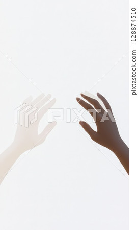 Diverse hands nearly touching, symbolizing connection, racial harmony, and mutual support against minimalist white backdrop 128874510