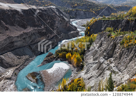 Autumn view blue water of Hunza River with mountain range in the background,Hunza, Pakistan. Autumn view blue water of Hunza River with mountain range in the background,Hunza, Pakistan. 128874944