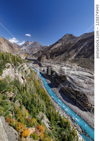 Autumn view blue water of Hunza River with mountain range in the background,Hunza, Pakistan. Autumn view blue water of Hunza River with mountain range in the background,Hunza, Pakistan. 128874949