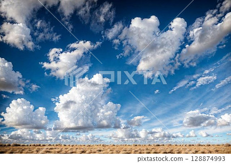 blue sky, clouds and horizon 128874993