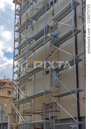 Scaffoldings Condo Building 128875735