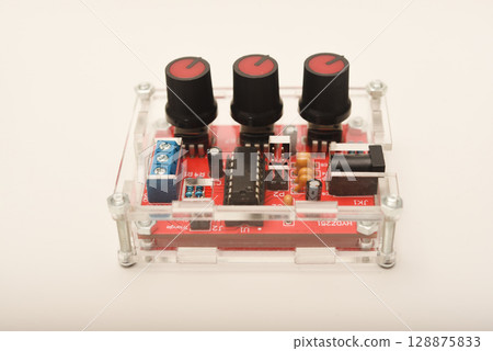 An assembled radio-electronic device. The signal generator. DIY kit for assembling an electronics enthusiast. An assembled radio-electronic device. The signal generator. DIY kit for assembling an electronics enthusiast. 128875833
