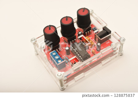 An assembled radio-electronic device. The signal generator. DIY kit for assembling an electronics enthusiast. An assembled radio-electronic device. The signal generator. DIY kit for assembling an electronics enthusiast. 128875837
