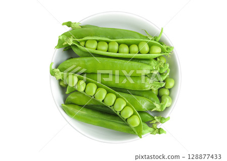 Fresh green pea pod with beans in ceramic bowl isolated on white background. Top view. Flat lay 128877433