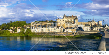 France, Loire valley castles. Great Amboise royal residence. view of medieval town across Loire river. France, Loire valley castles. Great Amboise royal residence. view of medieval town across Loire river. 128878424