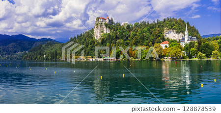 Beauty in nature. Lake scenery - magic lake Bled in Slowenia, popular tourist attraction Beauty in nature. Lake scenery - magic lake Bled in Slowenia, popular tourist attraction 128878539