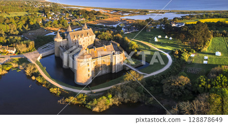 Most beautiful medieval french castles - amazing chateau de Suscinio (Susinio) over sunset in Brittany. Most beautiful medieval french castles - amazing chateau de Suscinio (Susinio) over sunset in Brittany. 128878649