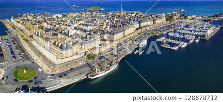 aerial panoramic view of Saint -Malo , historic French port in Ille-et-Vilaine, Brittany. France travel and landmarks. drone view of old city and harbour aerial panoramic view of Saint -Malo , historic French port in Ille-et-Vilaine, Brittany. France travel and landmarks. drone view of old city and harbour 128878712