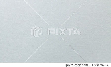Minimal Gray Surface with Soft Grainy Paper Texture Close-Up Minimal Gray Surface with Soft Grainy Paper Texture Close-Up 128878737