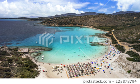 Sardegna (Sardinia) Italy. Best scenic beach in Villasimius. Beautiful Punta Molentis with turquoise trasparent sea , white beach and rocks. Aerial drone panoramic view 128878794