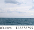 The deep blue Pacific Ocean meeting a dramatic overcast sky on the coast 128878795