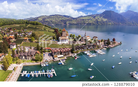 Canton Bern in Switzerland. aerial drone panorama of lake Thun and the Spiez village with medieval castle and old town 128879010