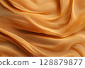 High structure abstract wavy beige light brown cloth fabric texture. Background for banner, texture 128879877
