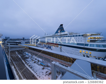 A cruise ship docked in the port of Tallinn in the early morning, Estonia / Tallinn, Estonia A cruise ship docked in the port of Tallinn in the early morning, Estonia / Tallinn, Estonia 128880362